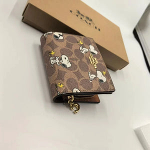Coach X Peanuts Snap Wallet Signature Canvas Snoopy Print CBN32